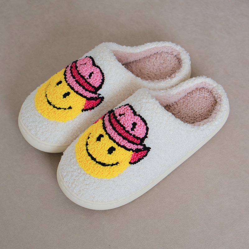Chaussons moumoute crème à smiley coiffé d'un chapeau de cowboy rose Bochausson