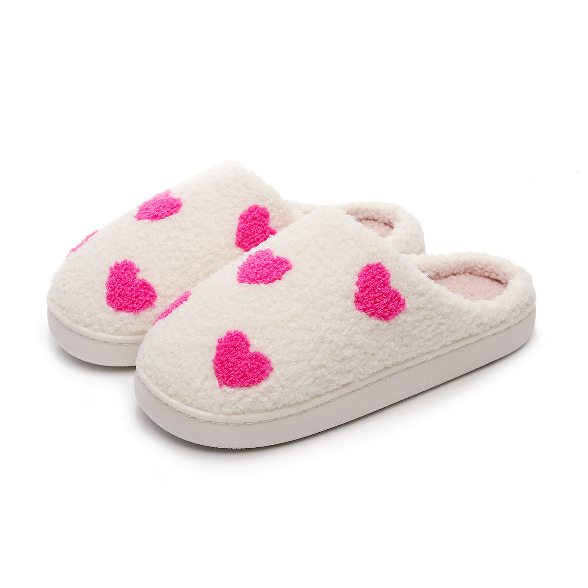 Chaussons Moumoute à Cœurs Bochausson coloris blanc et rose, vue trois-quarts de la paire