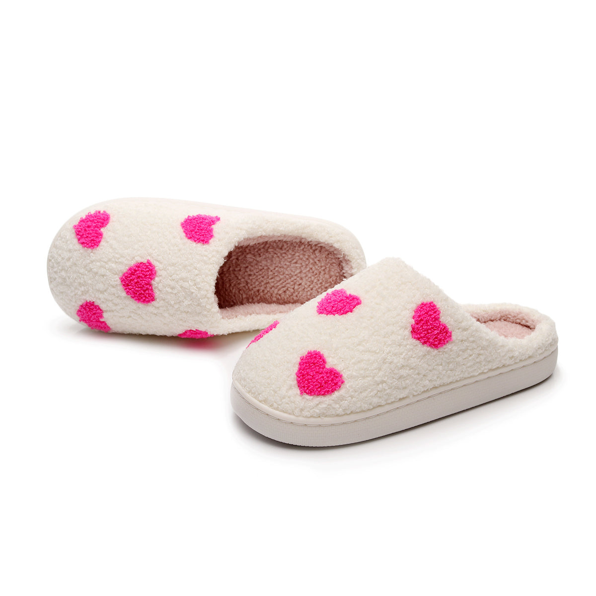 Chaussons Moumoute à Cœurs Bochausson coloris blanc et rose, vue de côté de la paire