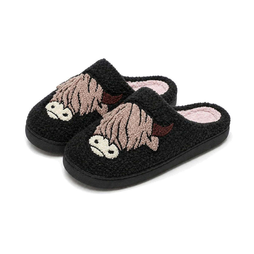 Chaussons Moumoute Vache Highland Bochausson coloris noir, vue trois-quarts de la paire